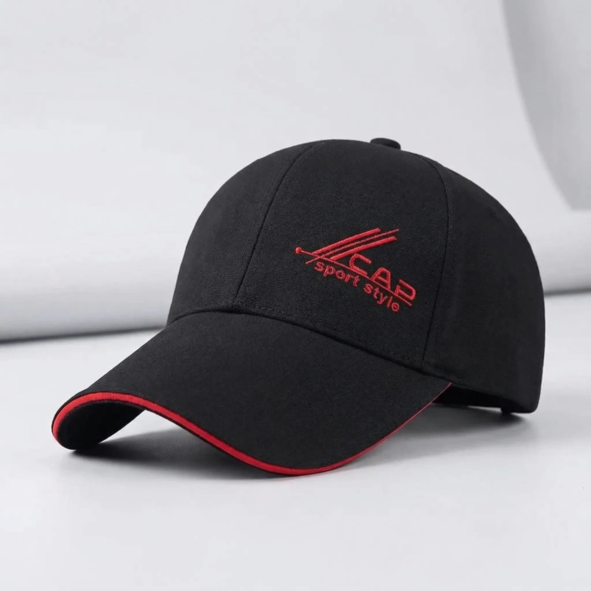 Long brim baseball cap with adjustable fit and sporty graphic detailing