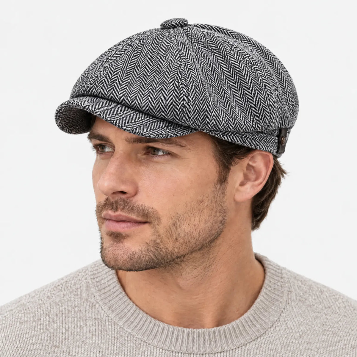 Eight-panel driver's cap with herringbone pattern and short bill