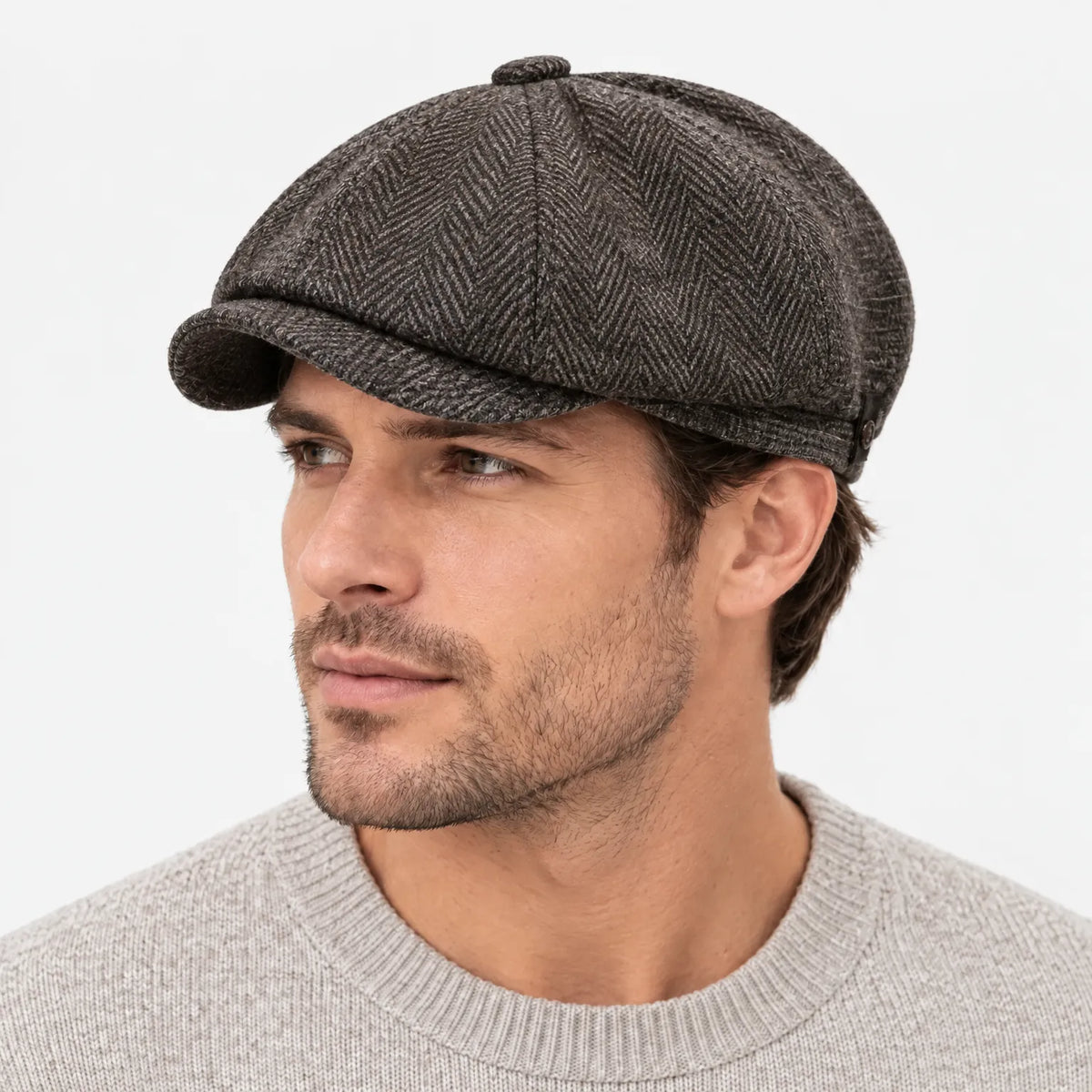 Eight-panel driver's cap with herringbone pattern and short bill