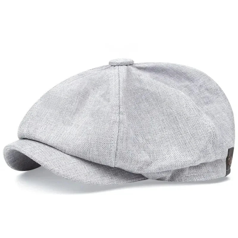 Eight-panel driver's cap with herringbone pattern and short bill