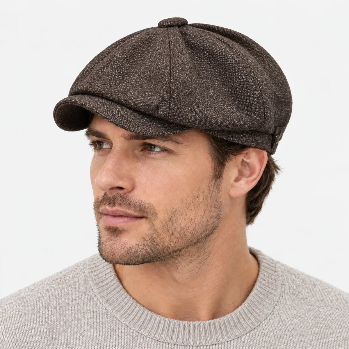 Eight-panel driver's cap with herringbone pattern and short bill