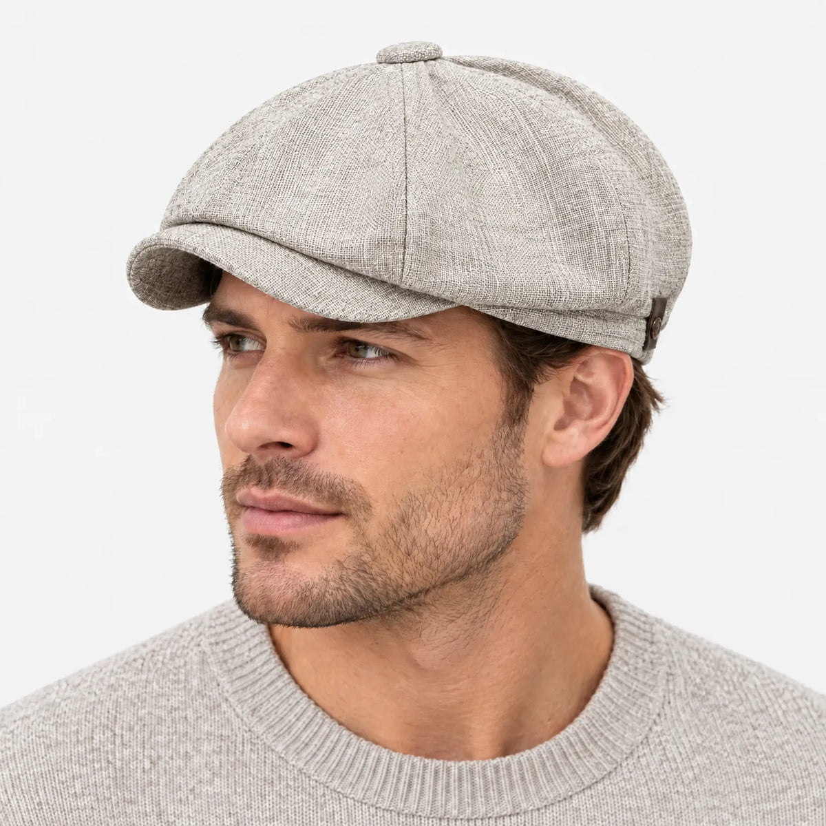 Eight-panel driver's cap with herringbone pattern and short bill