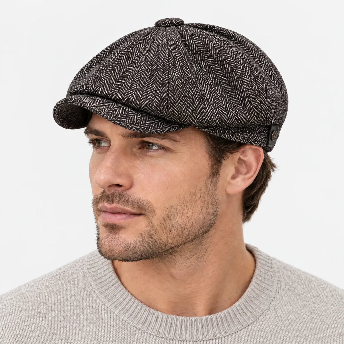 Eight-panel driver's cap with herringbone pattern and short bill