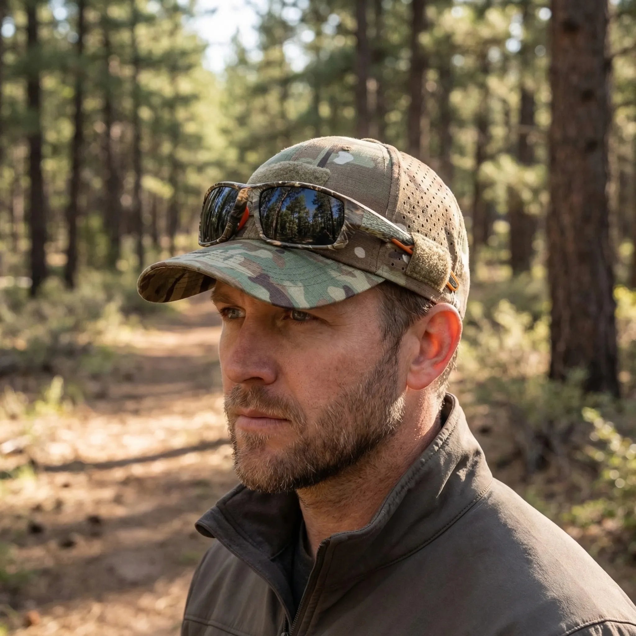 Men's camouflage baseball cap with breathable mesh construction and adjustable strap