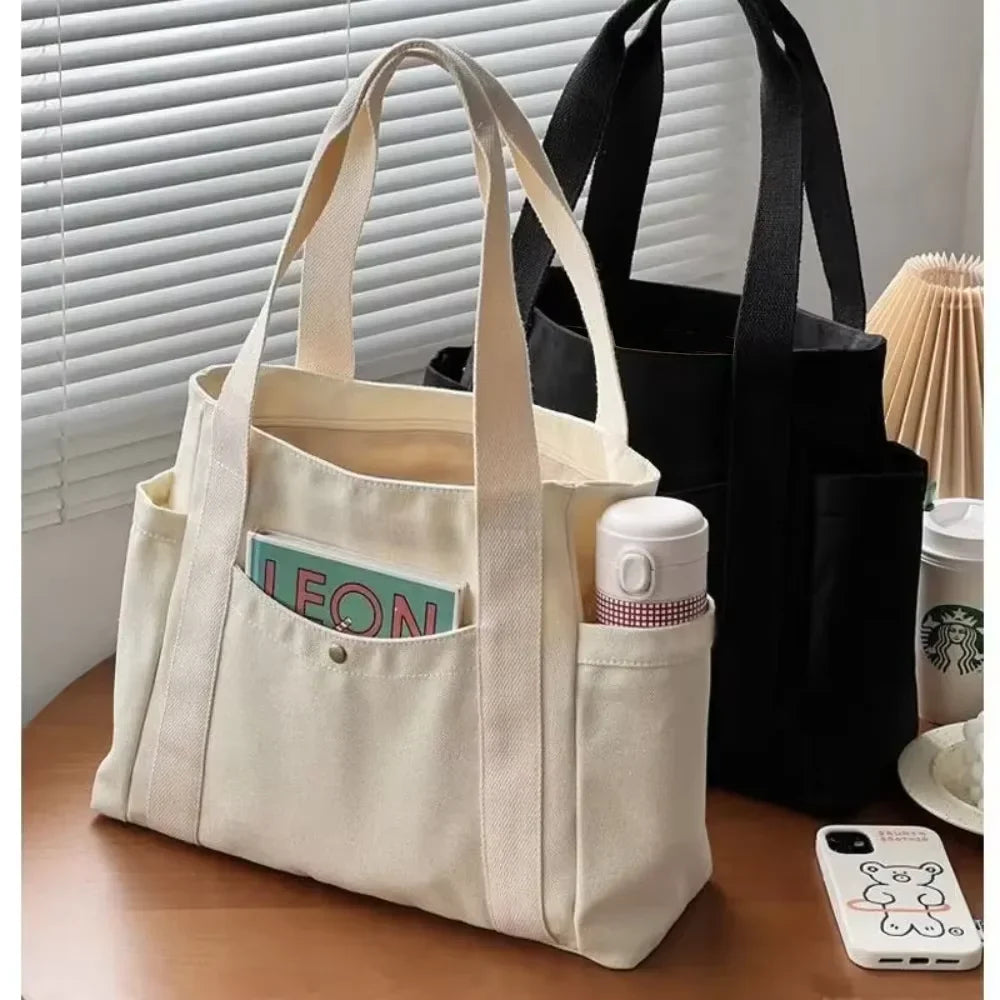 Shoulder bags canvas tote with structured base and side bottle pockets