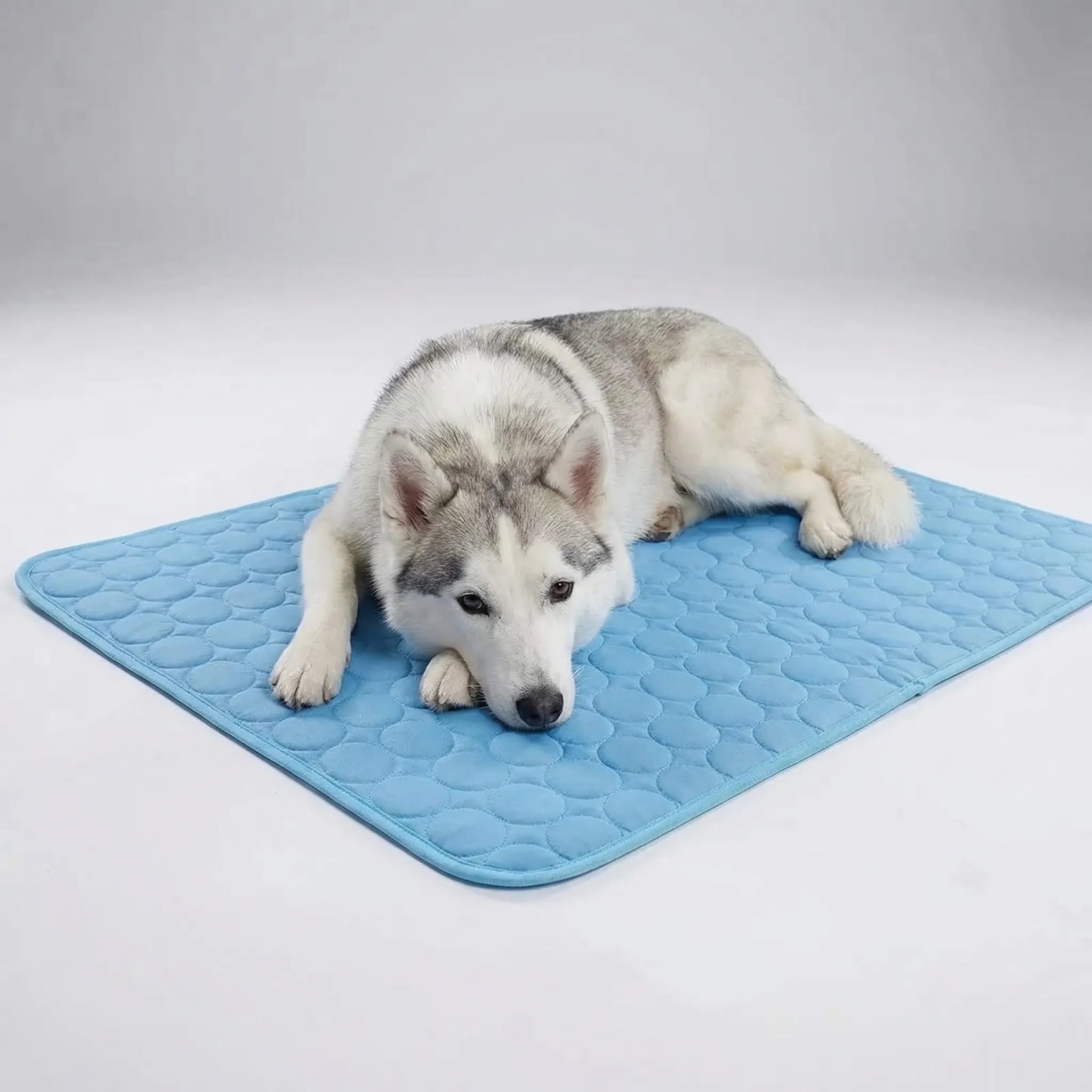 Quilted cooling mat for dogs and cats with breathable pebble-pattern surface