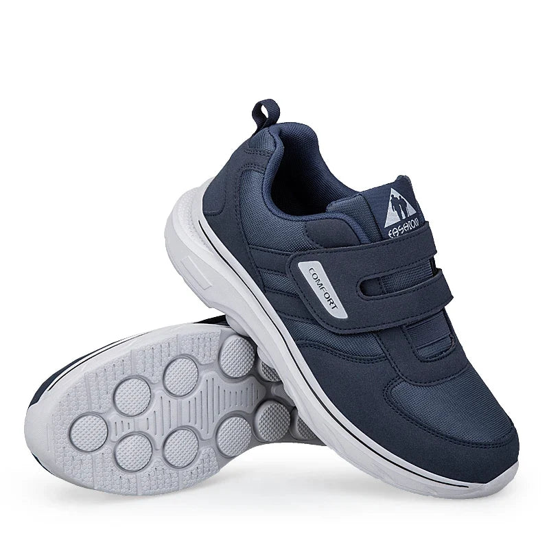 Orthopedic wide-fit walking sneaker with cushioned sole and hook-and-loop strap