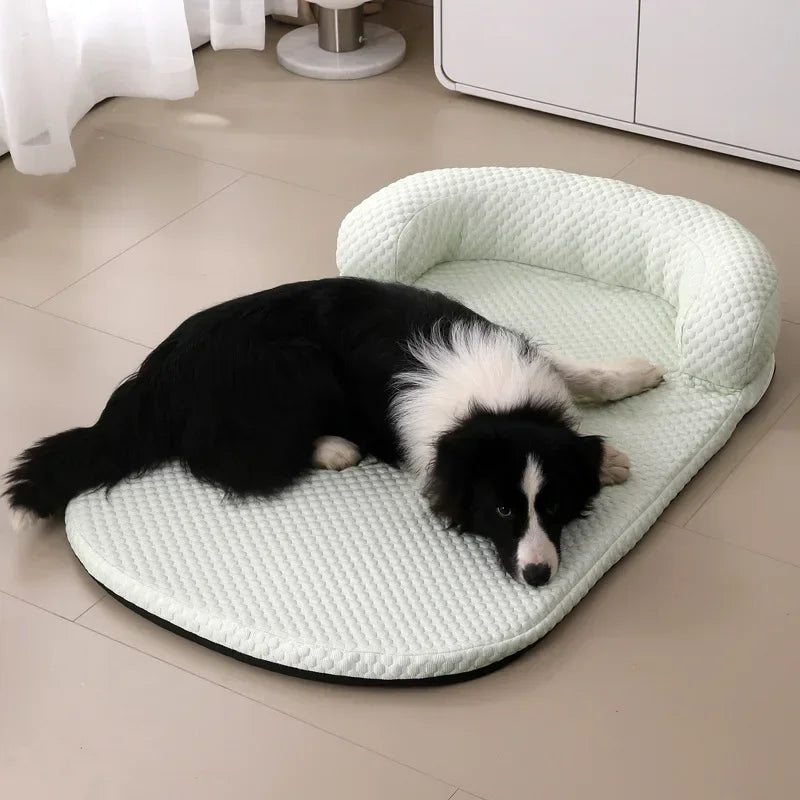 Cooling pet bed with foam base, removable washable cover and bolster headrest