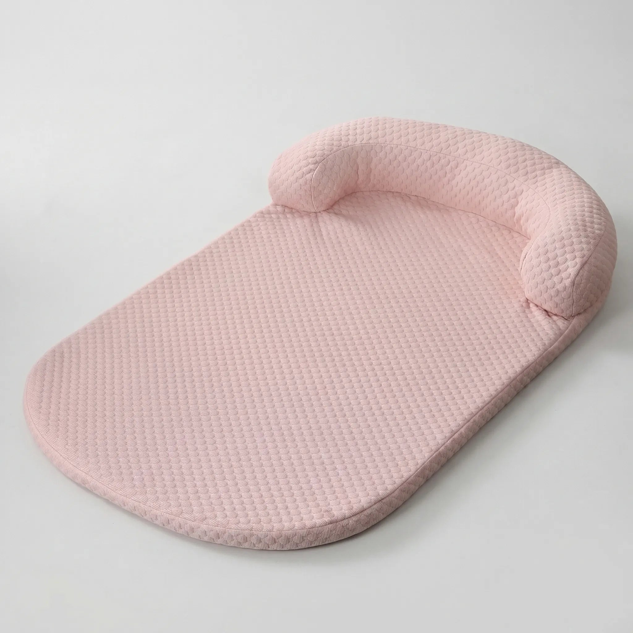 Cooling pet bed with foam base, removable washable cover and bolster headrest