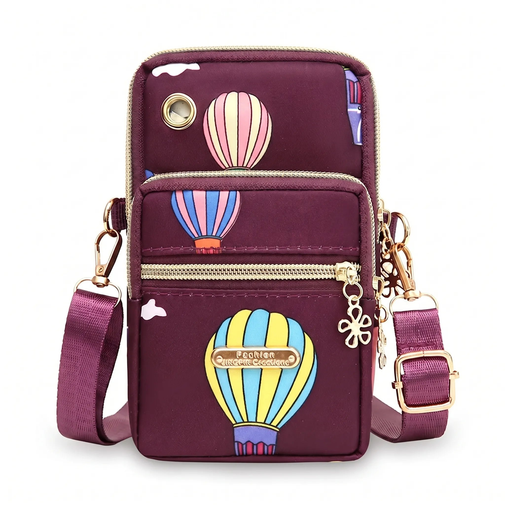Compact crossbody bag with multiple zip pockets and adjustable strap
