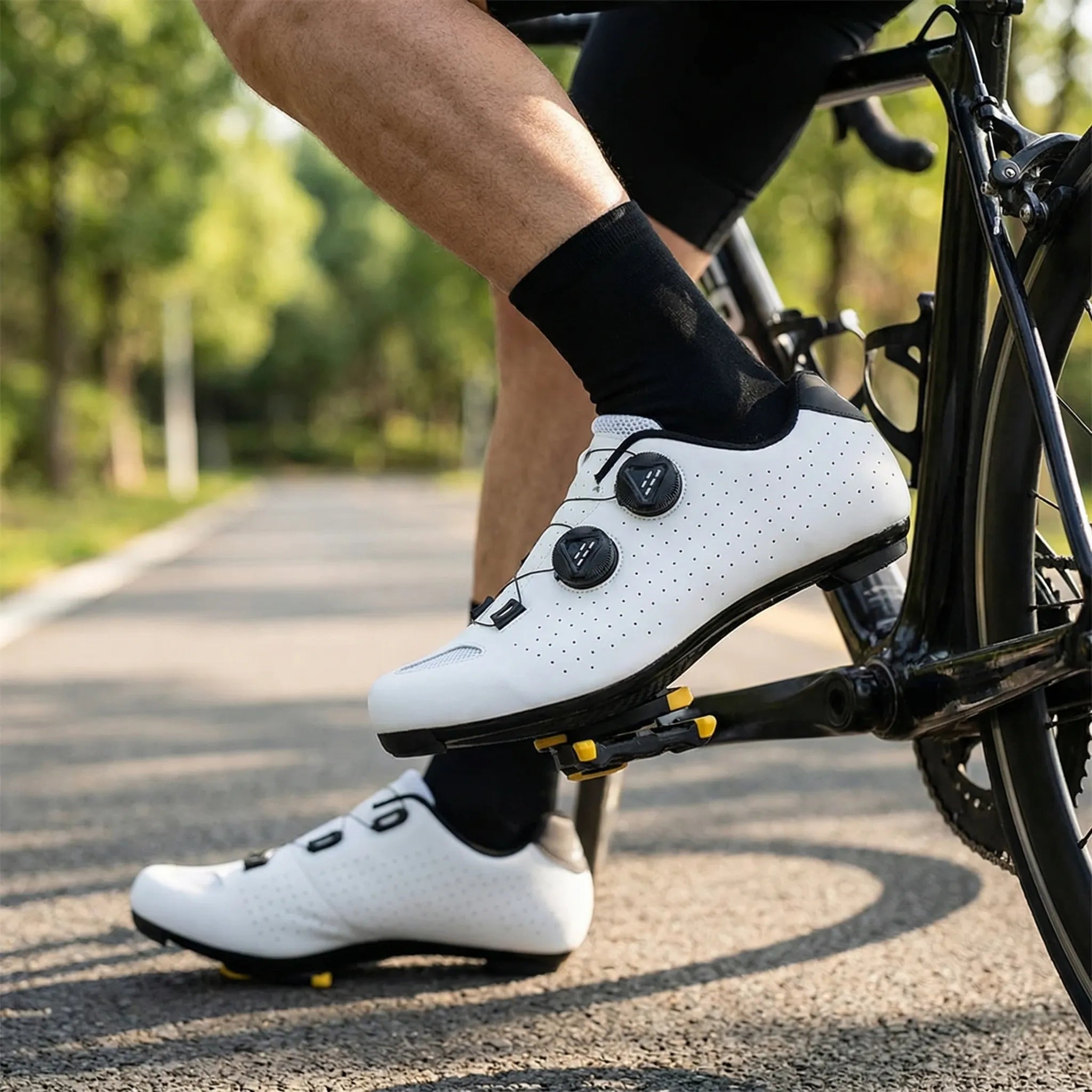 Cleat-compatible cycling shoe with dual rotary dial closure system for road and mountain biking