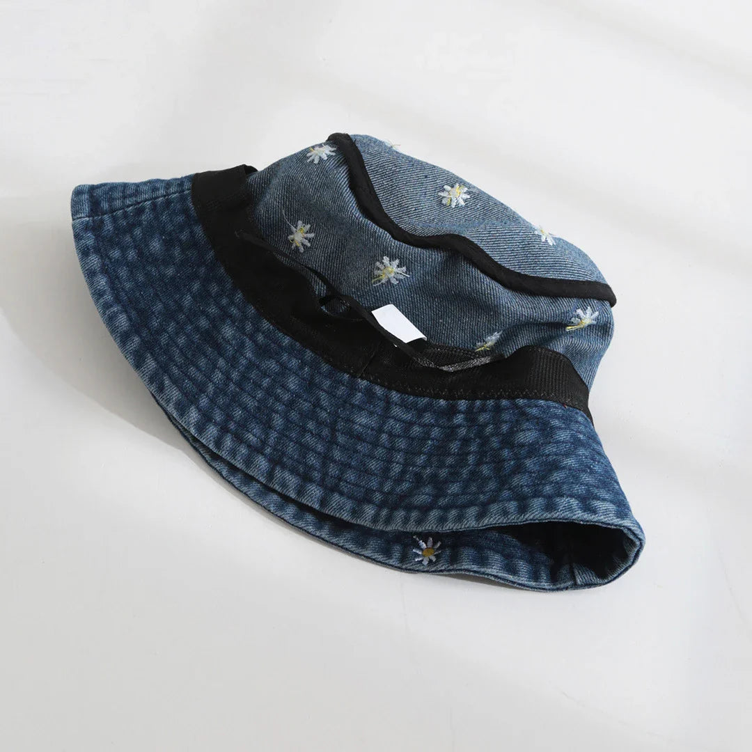 Daisy embroidered bucket hat with wide brim and washed denim finish