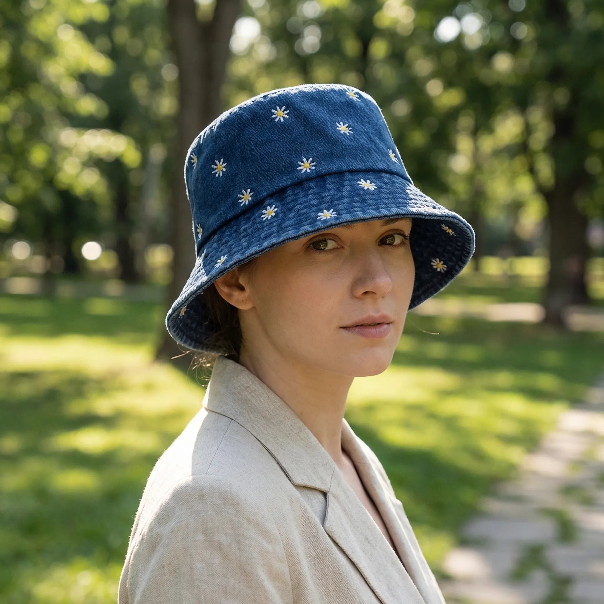 Daisy embroidered bucket hat with wide brim and washed denim finish