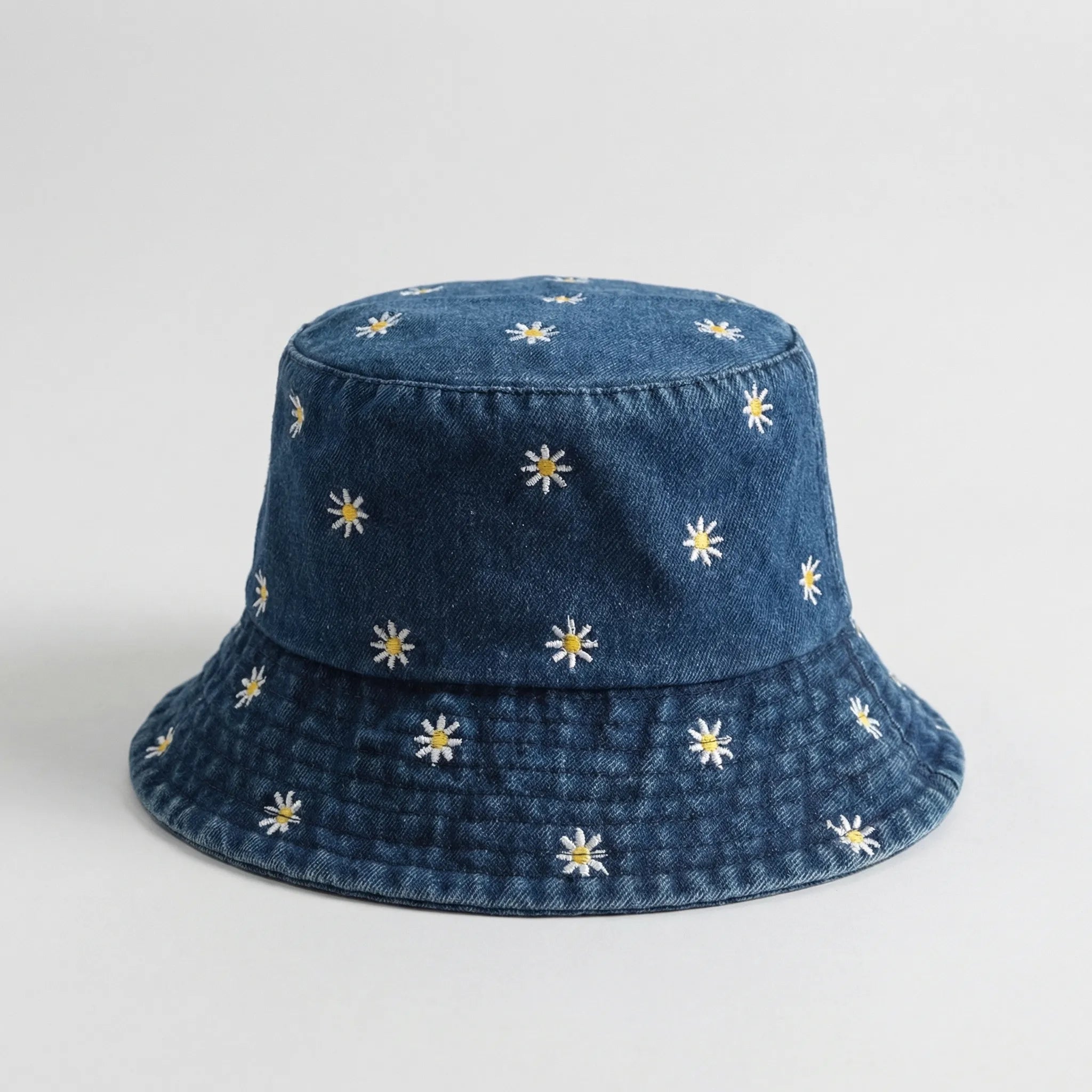 Daisy embroidered bucket hat with wide brim and washed denim finish
