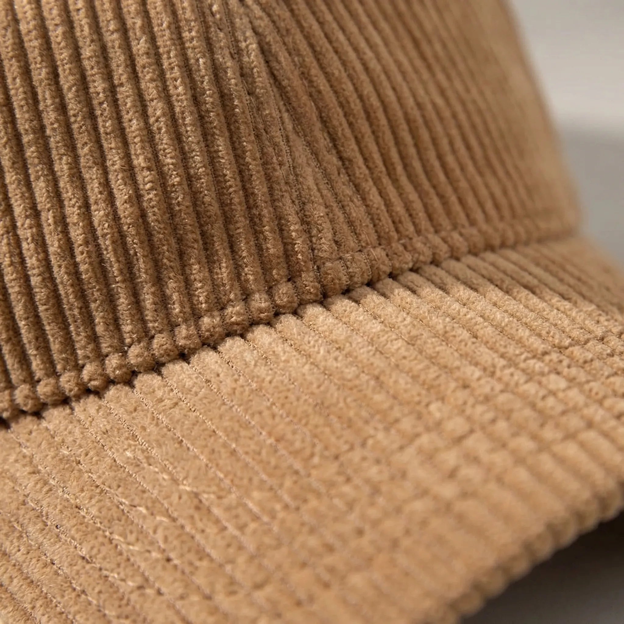 Corduroy baseball cap with curved brim and structured crown
