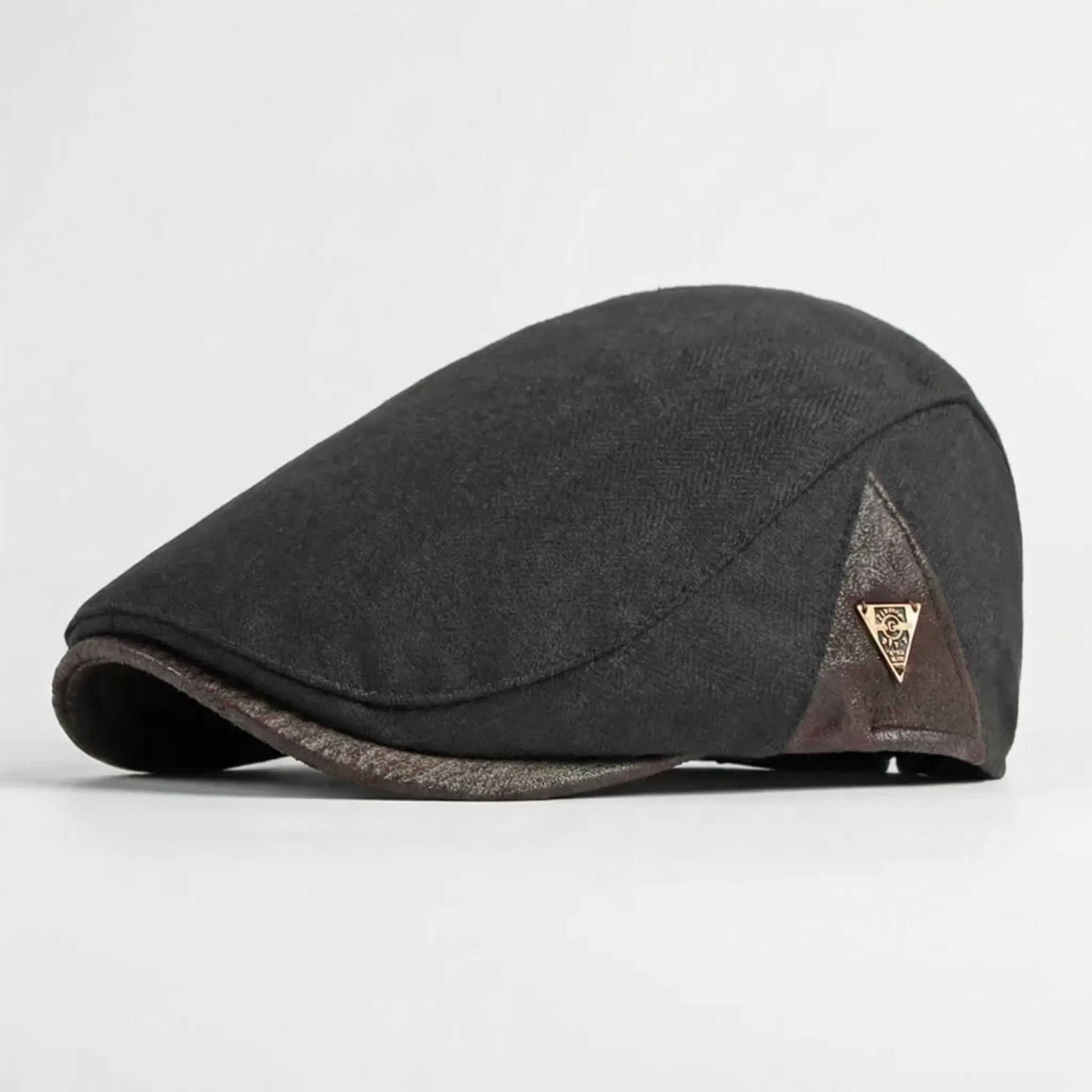 Men's herringbone flat cap with structured brim and triangular metal badge