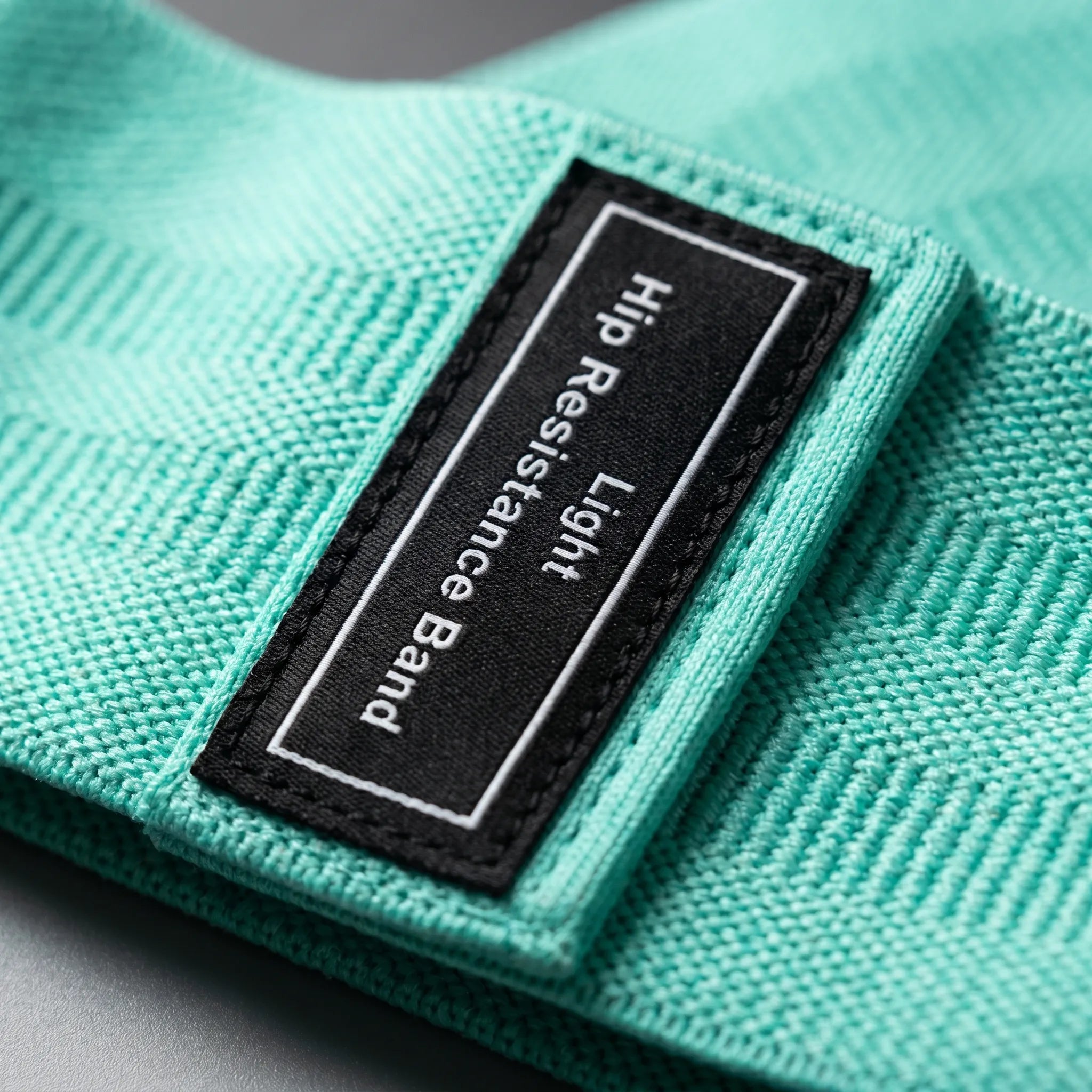 Fabric resistance loop bands with wide anti-roll design and color-coded tension levels
