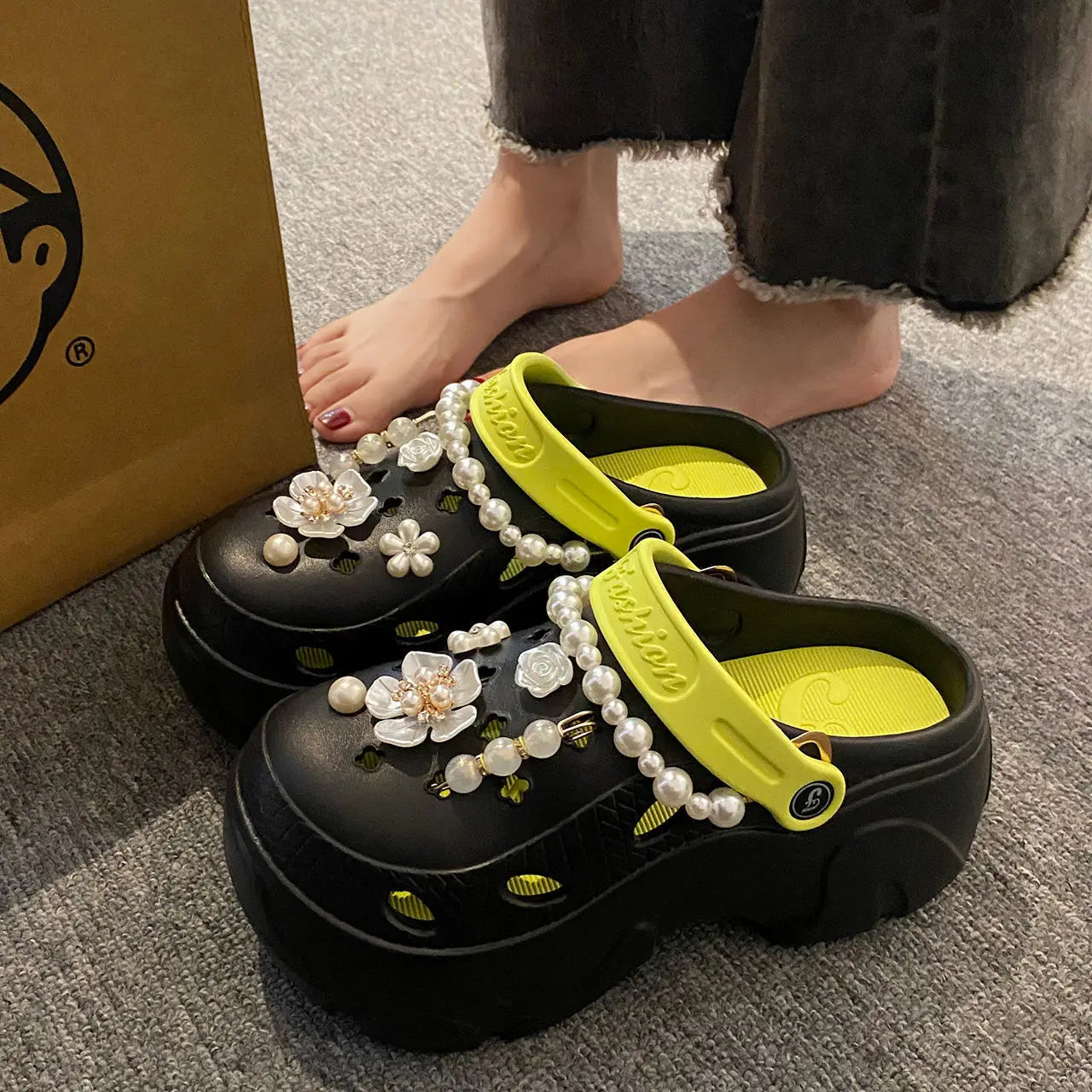 Chunky platform summer clogs with faux pearl chains and flower accents