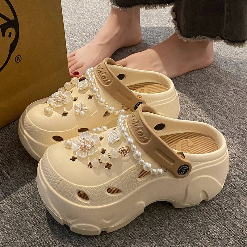 Chunky platform summer clogs with faux pearl chains and flower accents