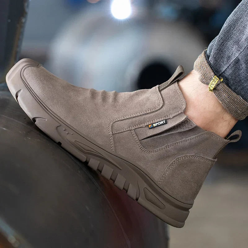 Slip-on safety boot with reinforced toe protection and puncture-resistant sole