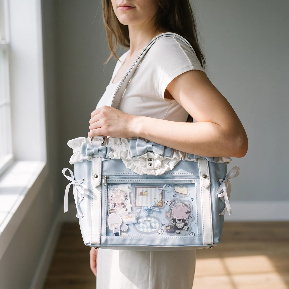 Shoulder bag with clear display window, ruffled trim and bows, preppy style