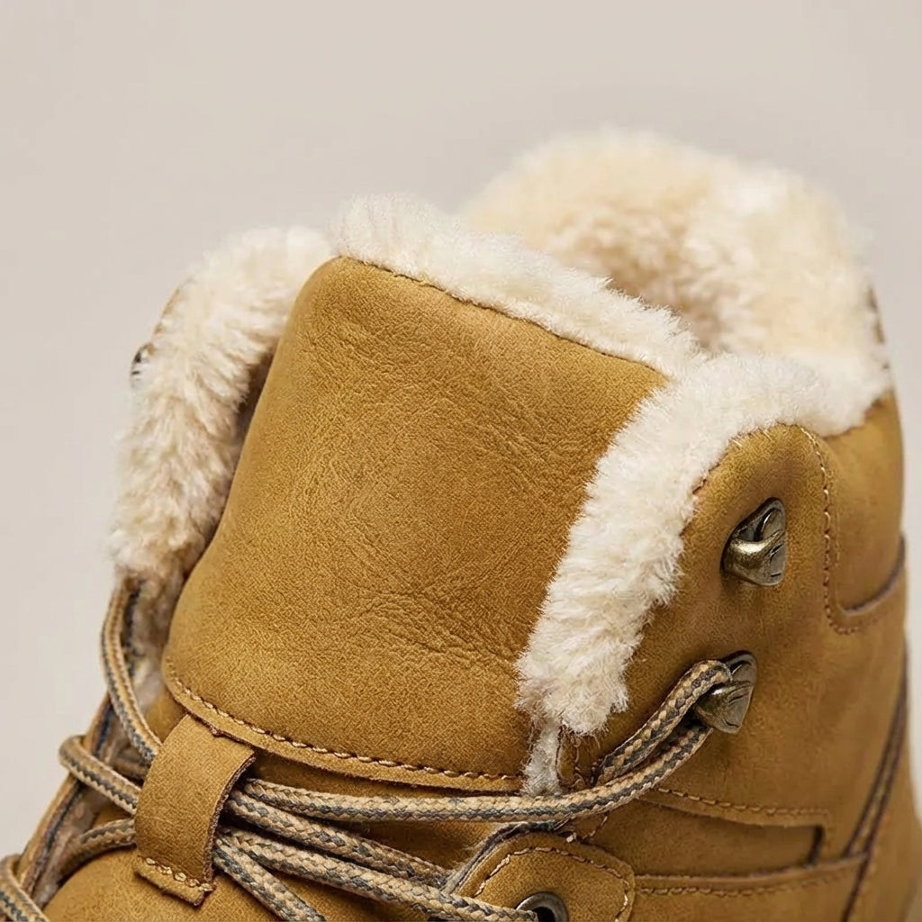 Men's winter hiking boot with high top ankle support and non-slip tread
