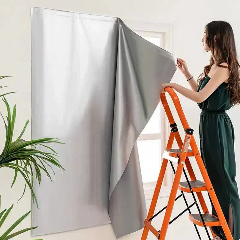 Self-adhesive window sunshade with double-sided reflective finish