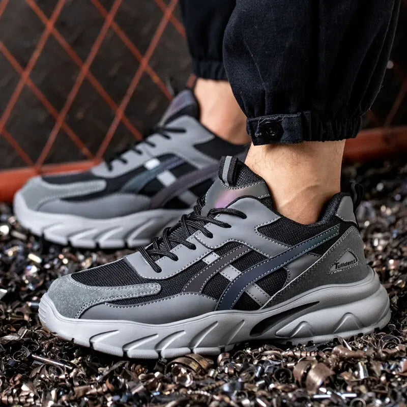 Lightweight safety sneaker with puncture-resistant sole and slip-resistant tread