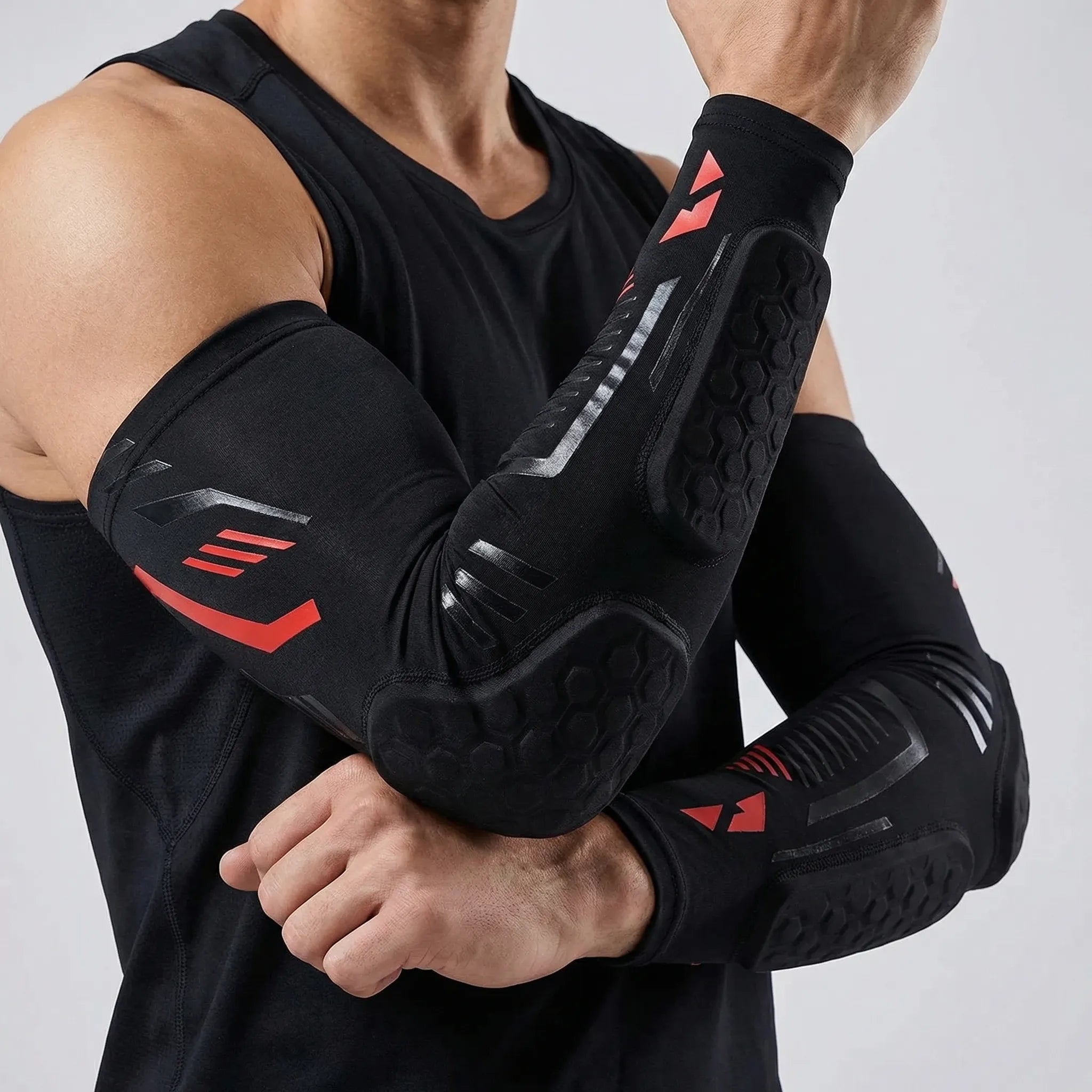 Padded compression arm sleeve with honeycomb elbow protection