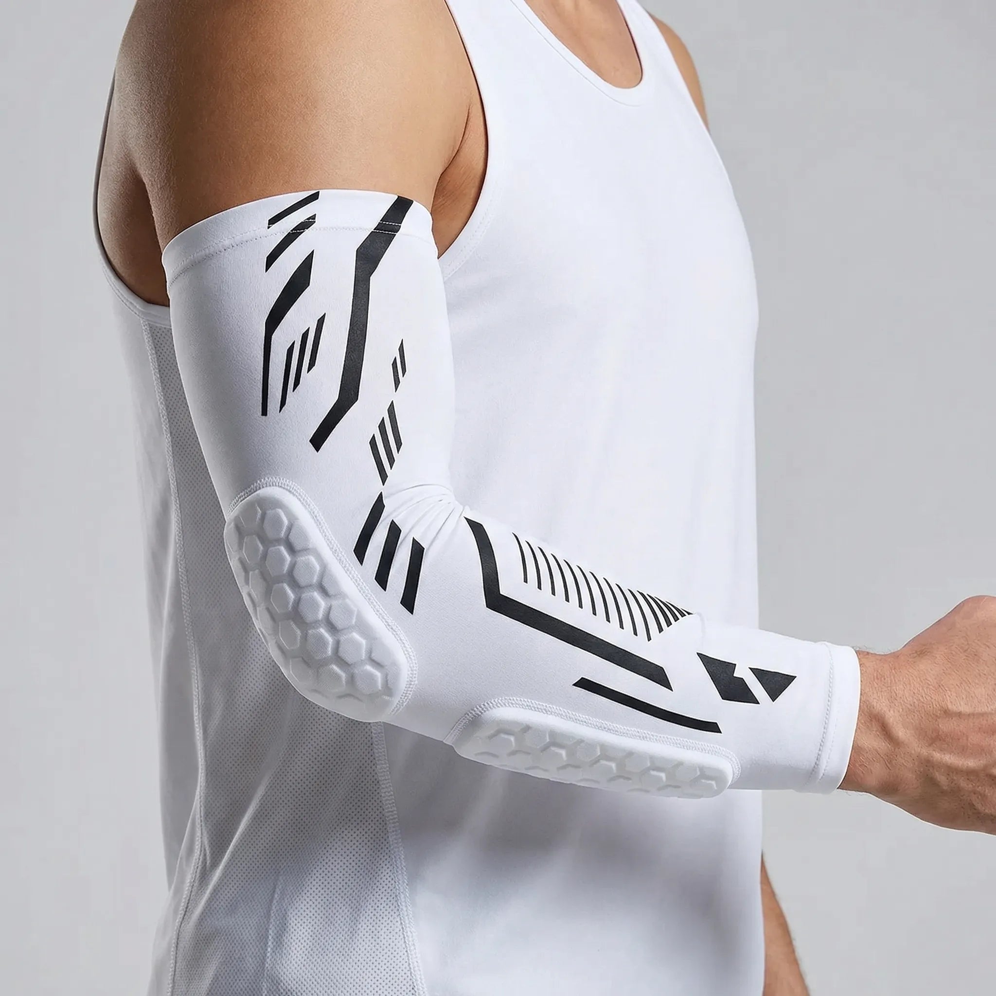Padded compression arm sleeve with honeycomb elbow protection