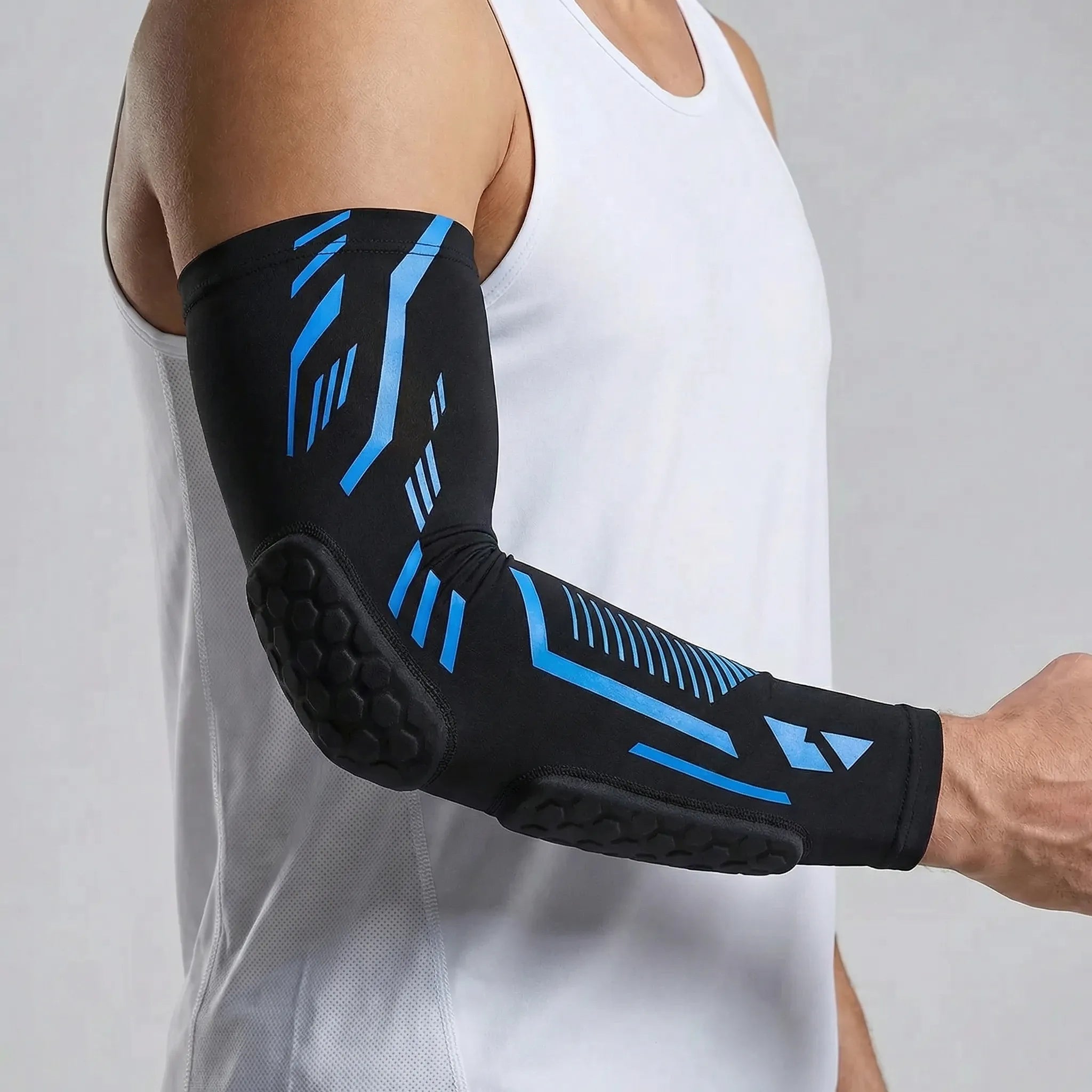 Padded compression arm sleeve with honeycomb elbow protection