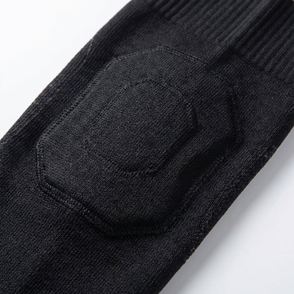 Full leg compression sleeve with targeted knee support and silicone grip band