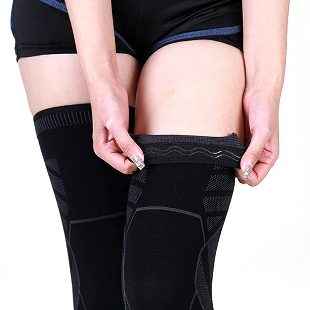 Full leg compression sleeve with targeted knee support and silicone grip band