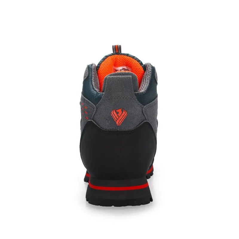 Men's mid-ankle hiking boot with waterproof upper and rugged traction sole