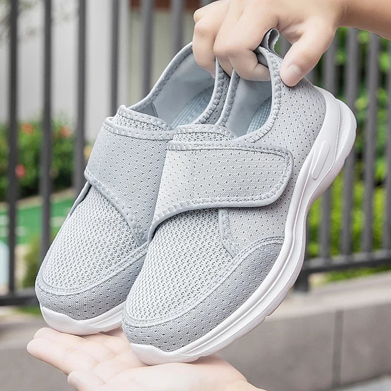 Wide fit orthopedic shoe with adjustable hook-and-loop strap