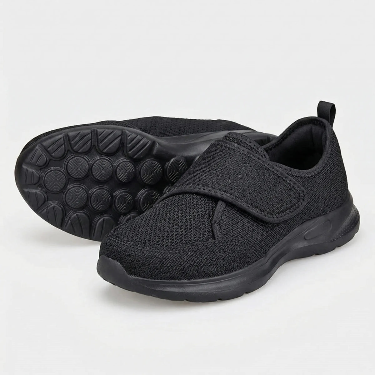 Wide fit orthopedic shoe with adjustable hook-and-loop strap