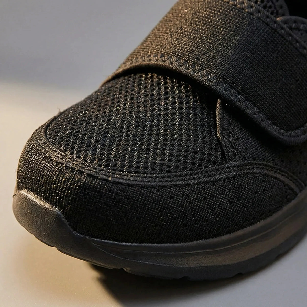 Wide fit orthopedic shoe with adjustable hook-and-loop strap