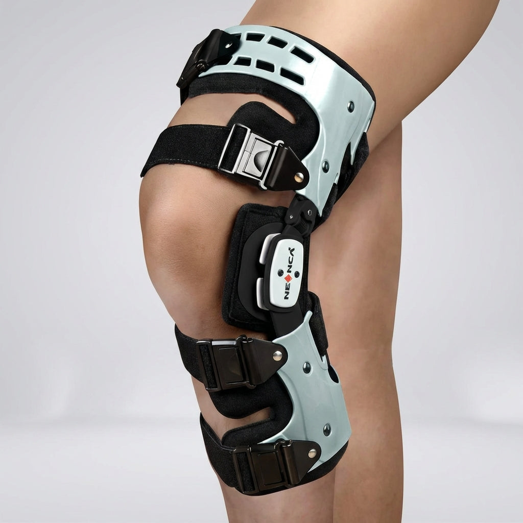 Unloader knee brace with adjustable hinges and cushioned support