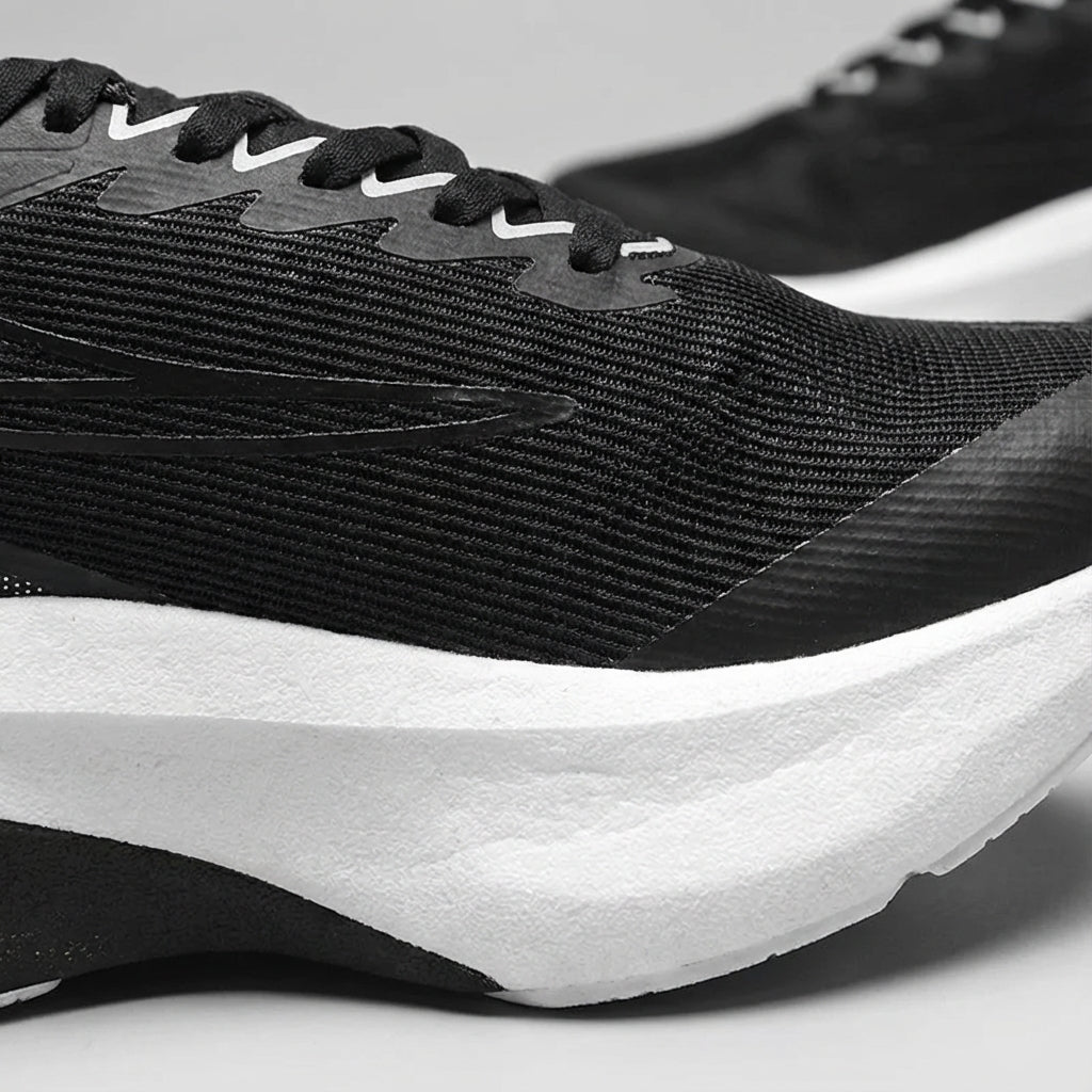 Running shoe with breathable mesh upper and cushioned sole