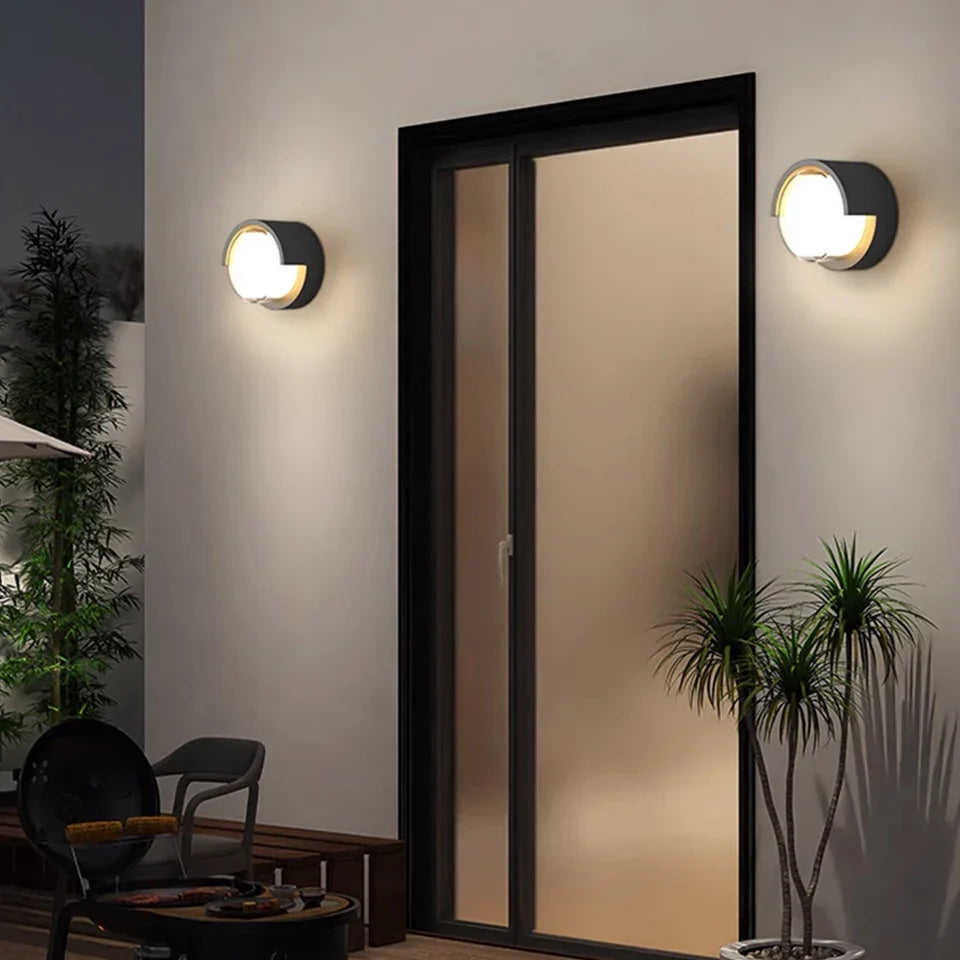 Round LED wall light with warm and cool white options for indoor and outdoor use