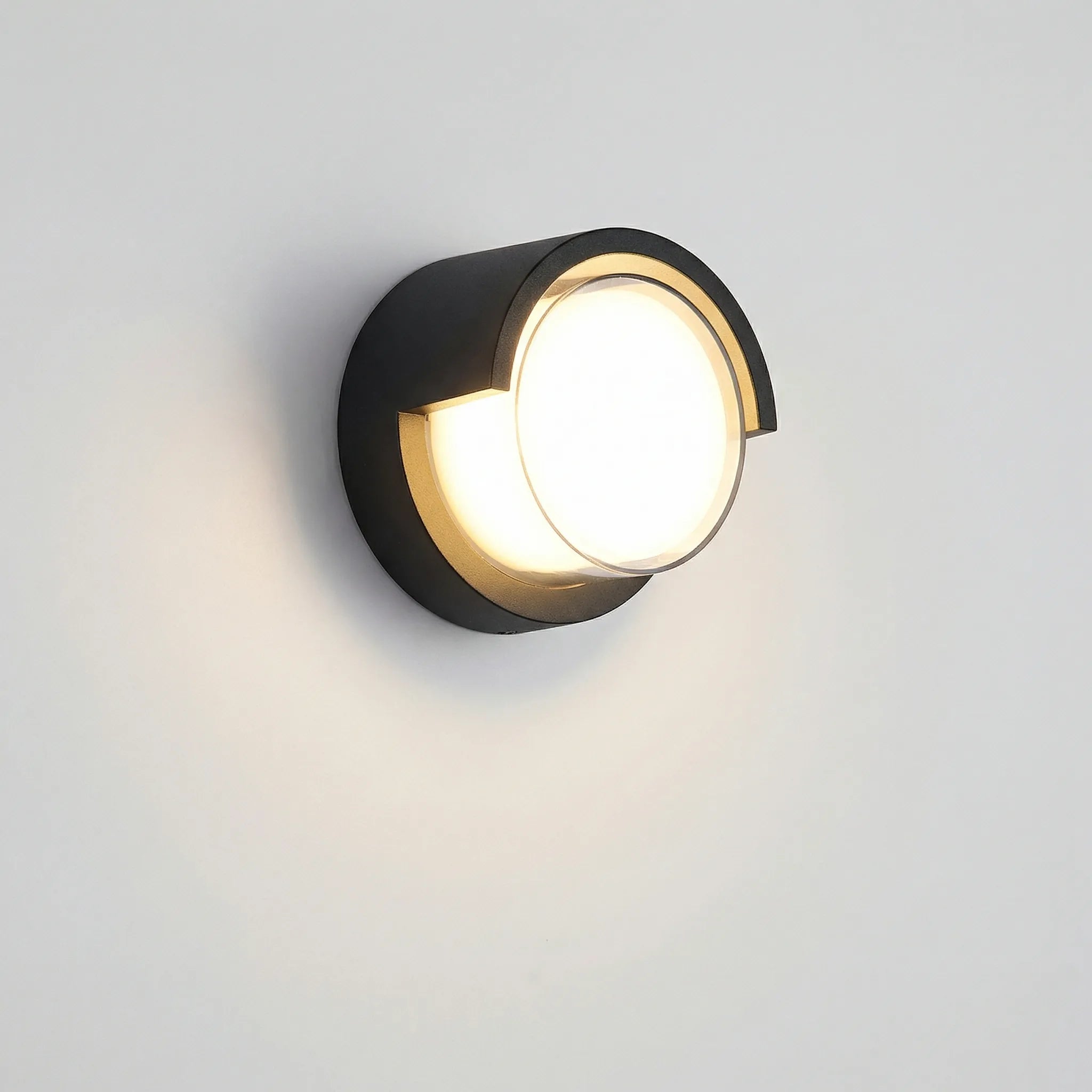 Round LED wall light with warm and cool white options for indoor and outdoor use