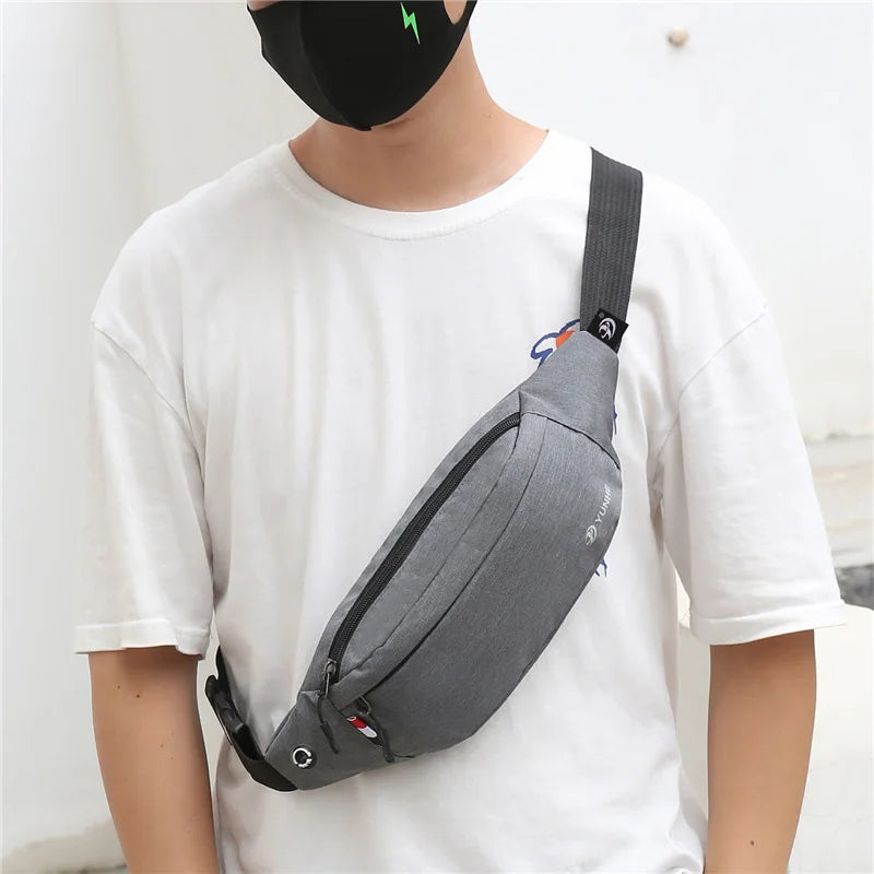Waterproof nylon waist pack with adjustable strap and compartments
