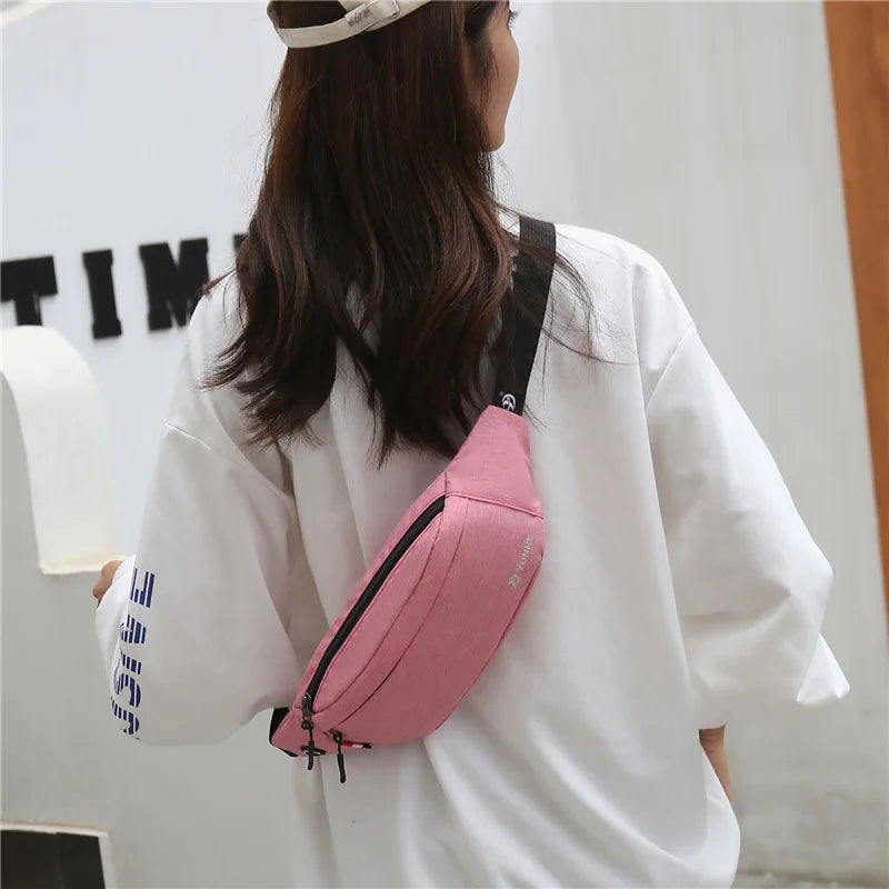 Waterproof nylon waist pack with adjustable strap and compartments