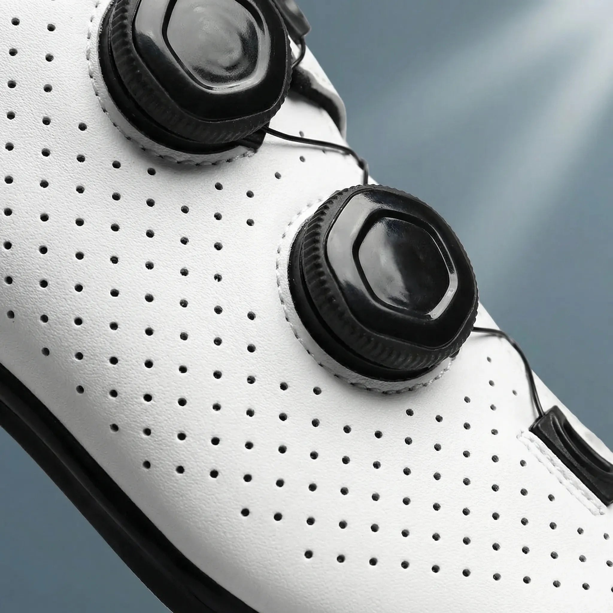 Road cycling shoe with dual rotary dial closure and Shimano cleat mount