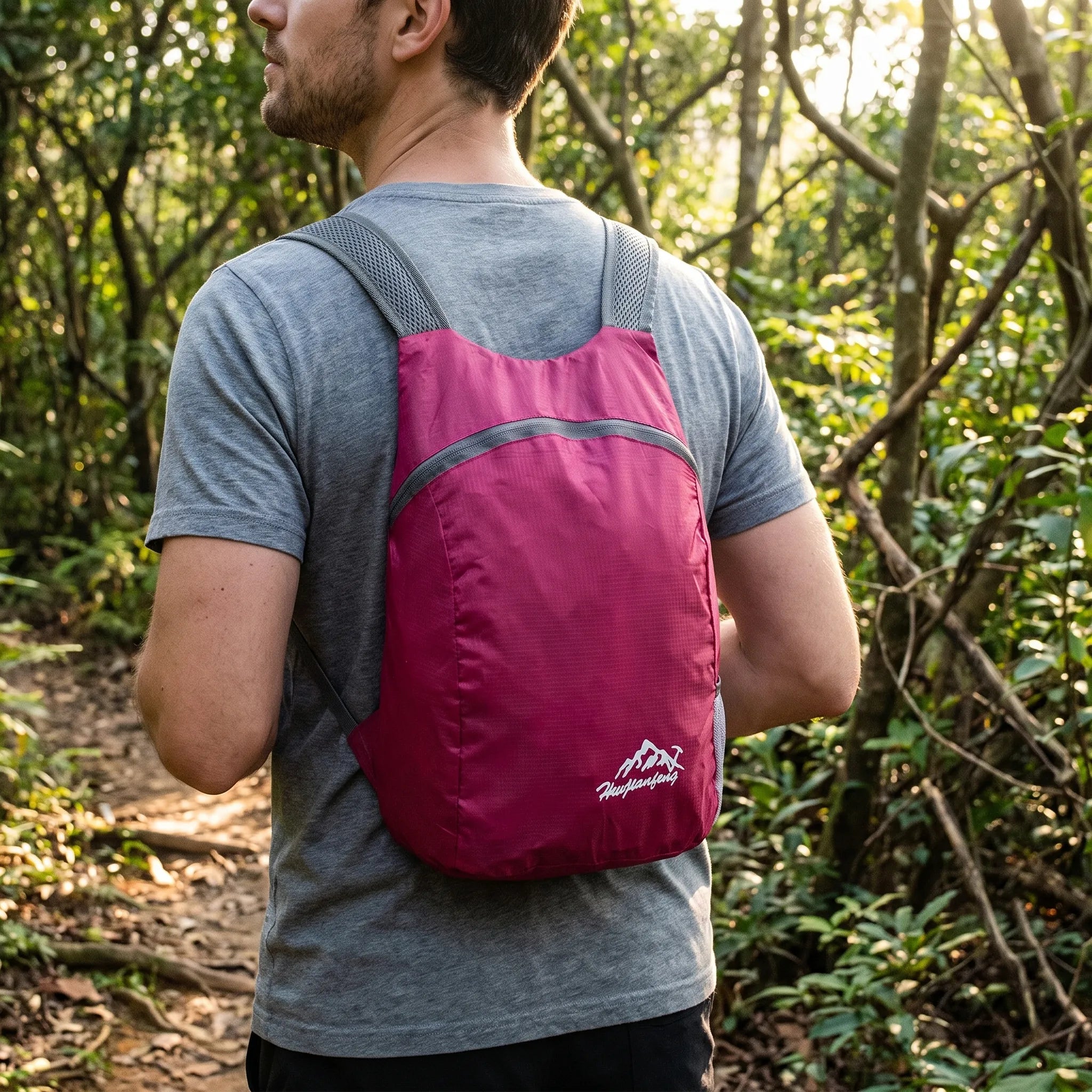 Foldable lightweight daypack with water-repellent outer shell and ventilated mesh straps