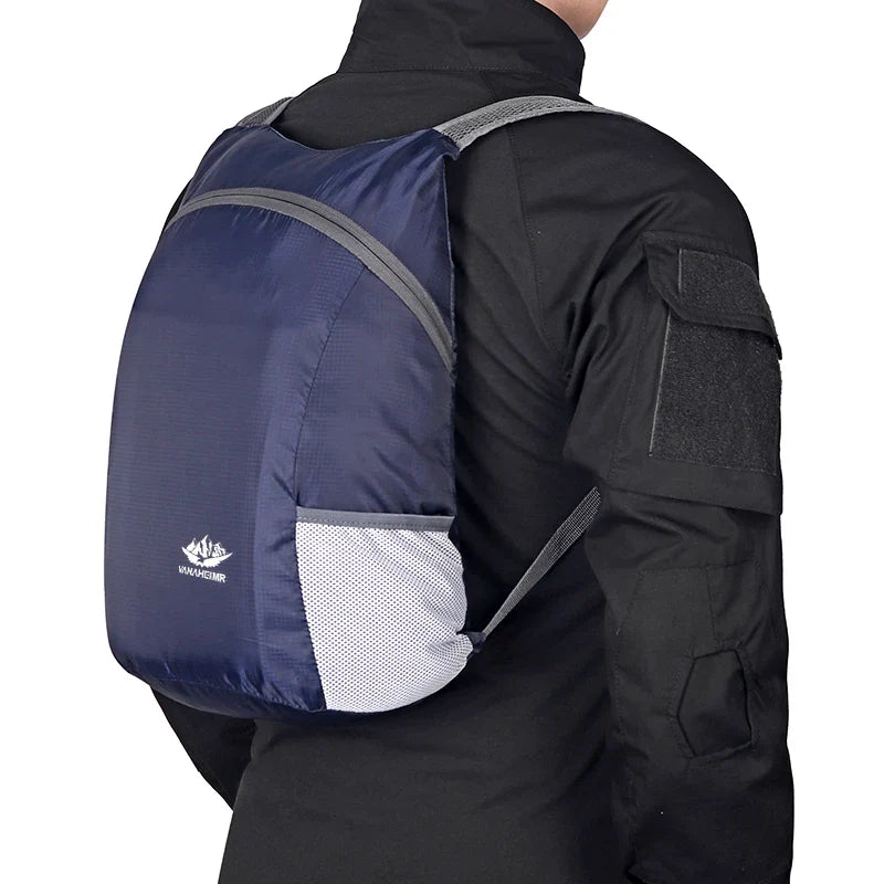 Foldable lightweight daypack with water-repellent outer shell and ventilated mesh straps