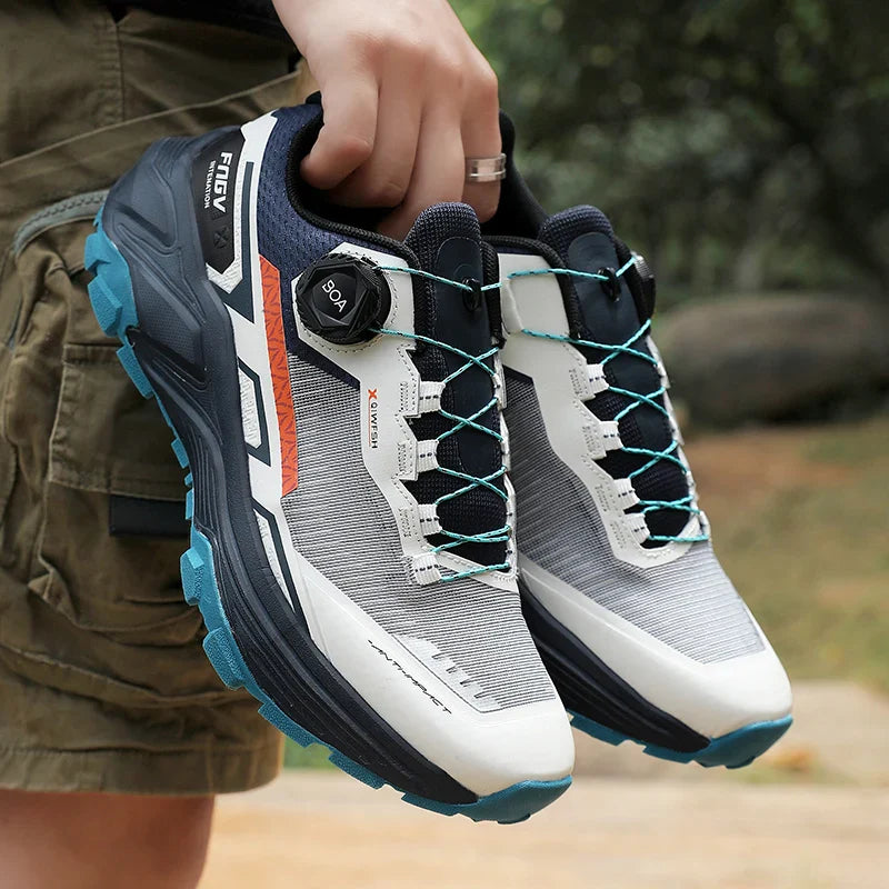 Low cut trail running shoe with breathable mesh and aggressive outsole