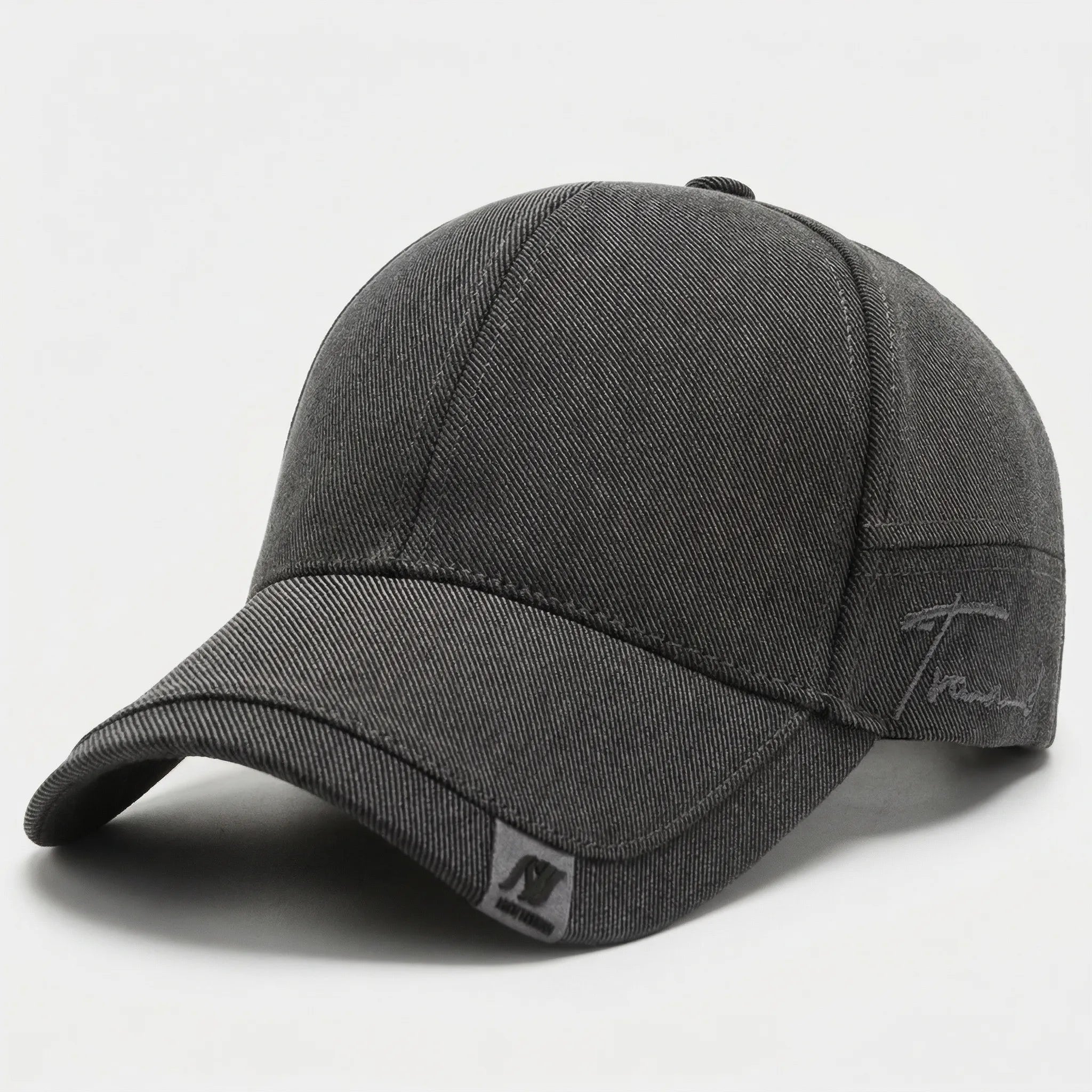 Minimalist baseball cap with curved peak and adjustable back strap