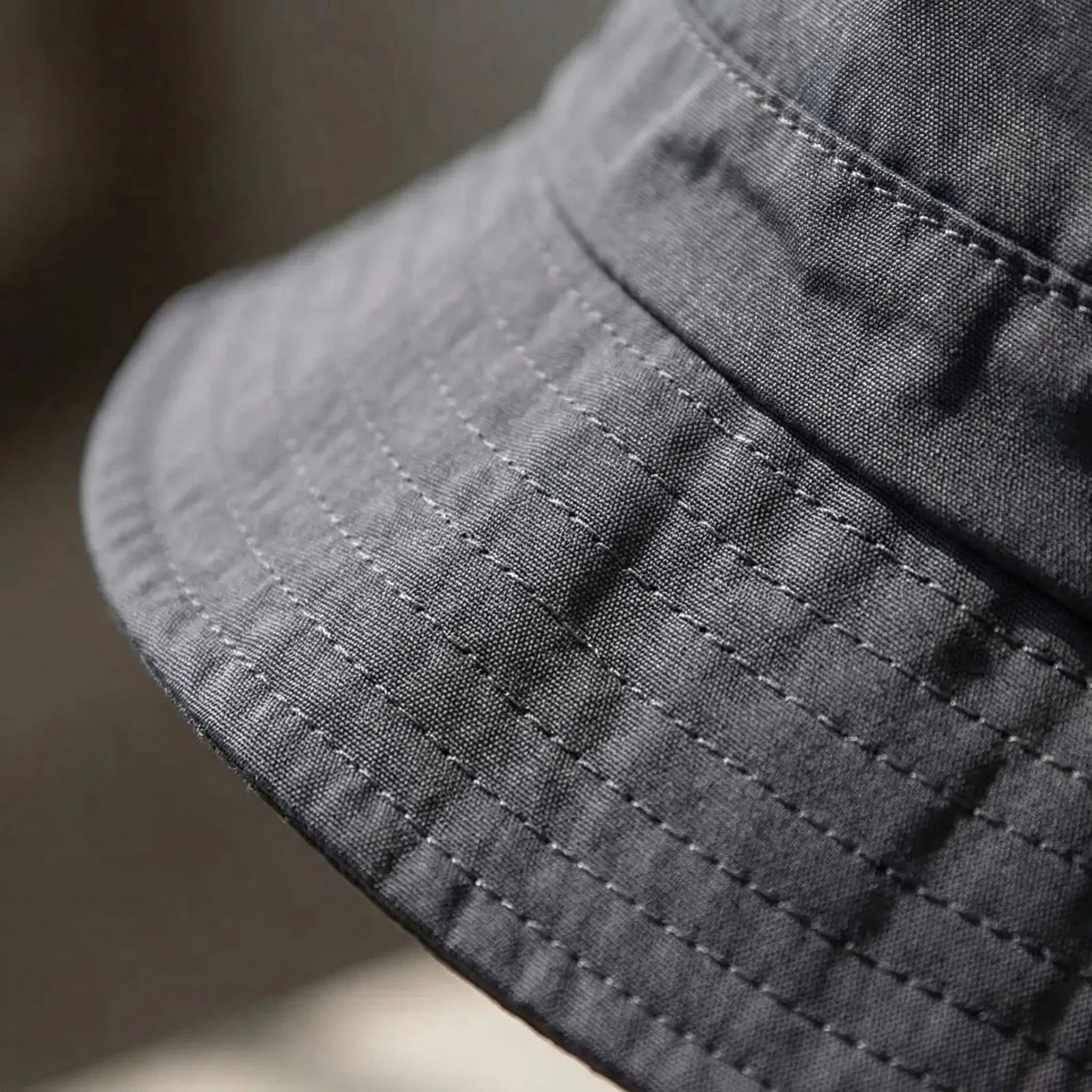 Wide-brim water-resistant fishing hat with UV protection for outdoor activities