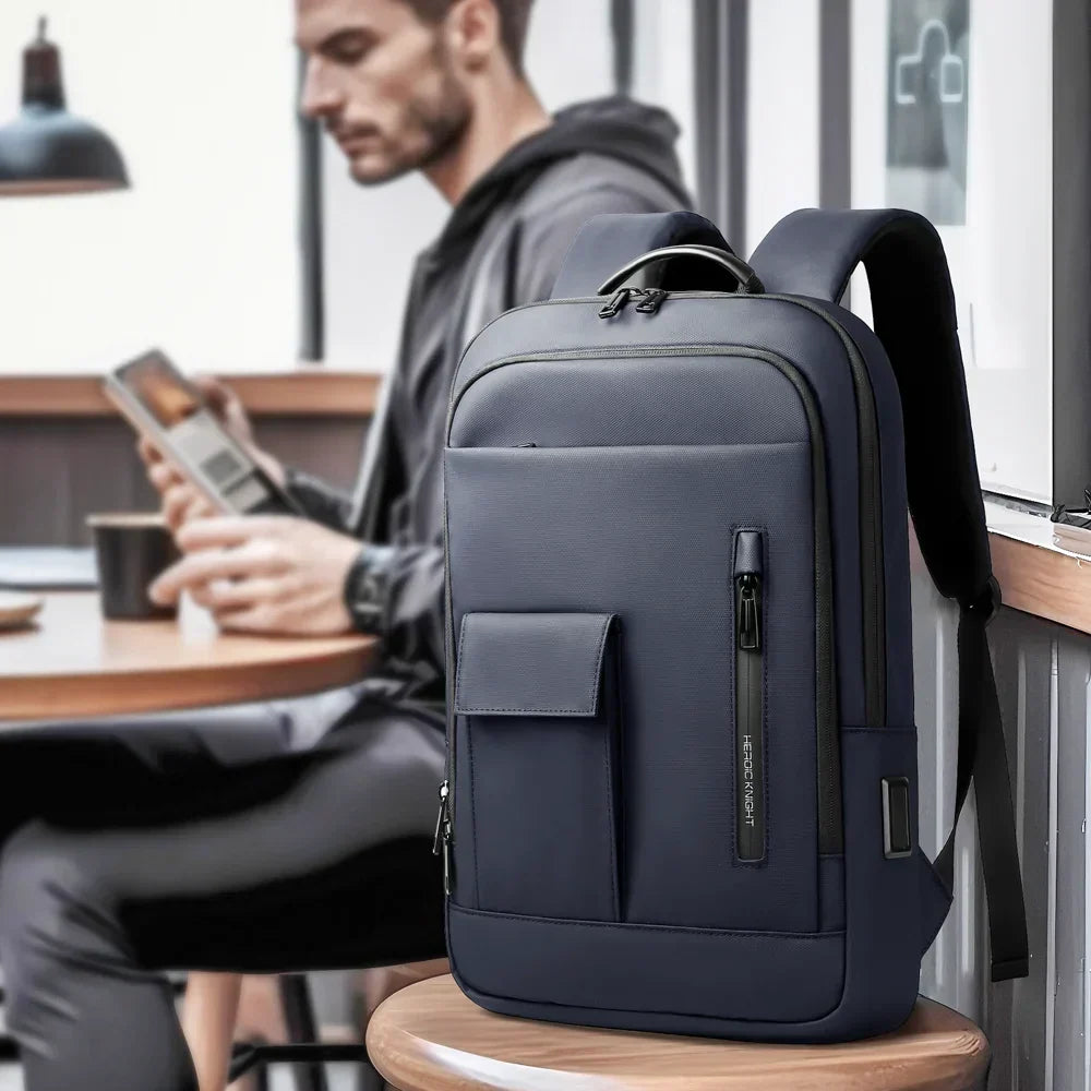 Slim water-resistant laptop backpack with USB charging port and padded compartment